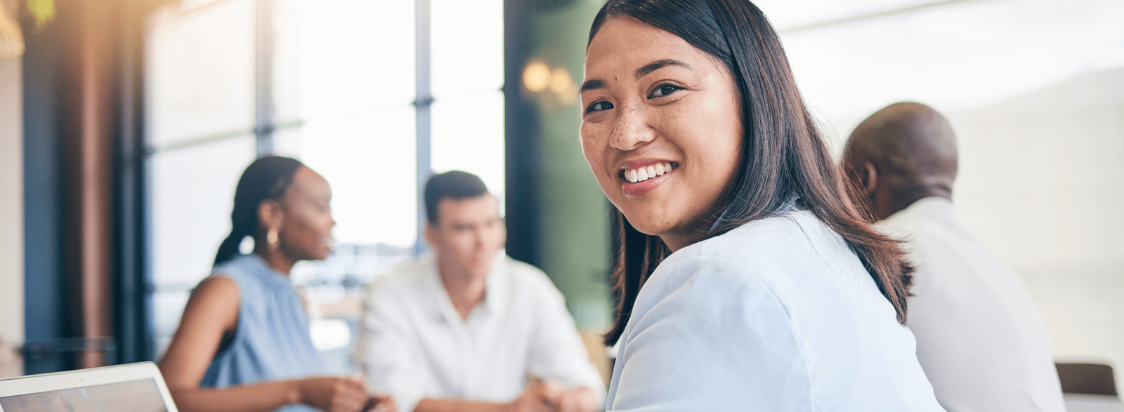 A smiling young woman