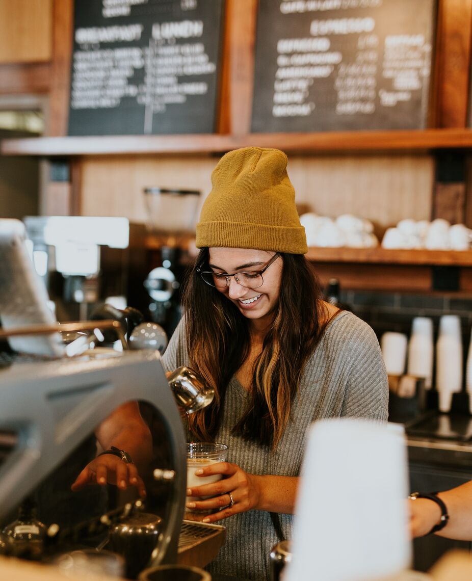 barista making coffee